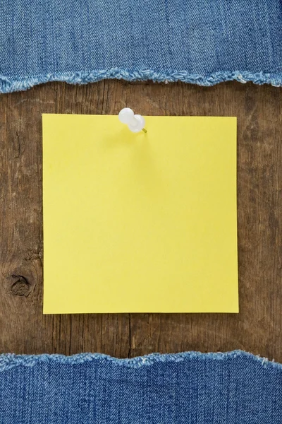 Blue jean on wood texture — Stock Photo, Image