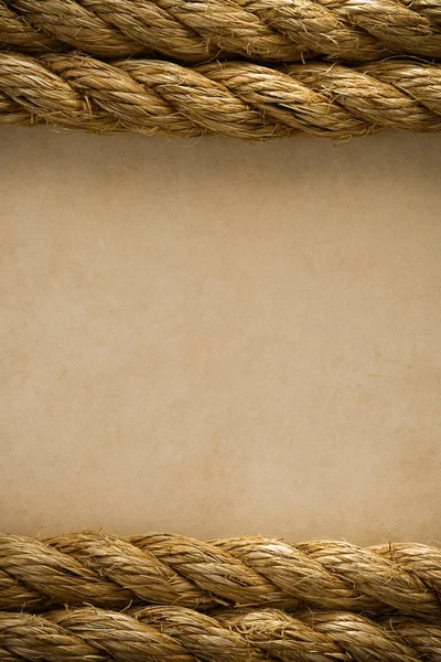 Ropes on old vintage paper background — Stock Photo, Image