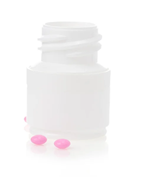 Pills and bottle on white — Stock Photo, Image