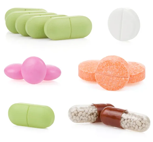 Pills and bottle on white — Stock Photo, Image