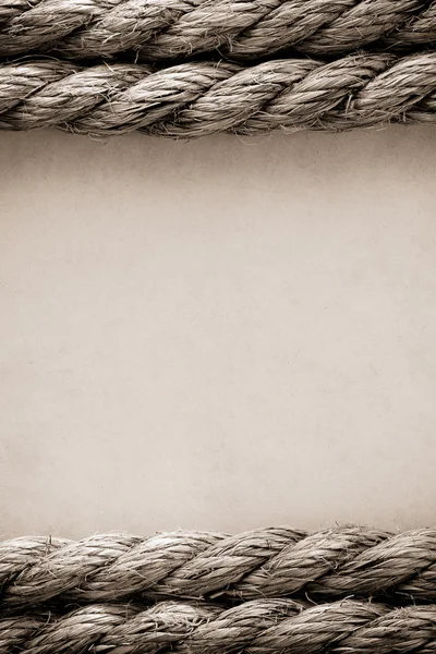 Ropes on old vintage paper background — Stock Photo, Image