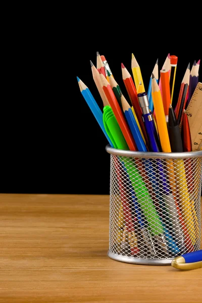 Holder basket and school supplies — Stock Photo, Image