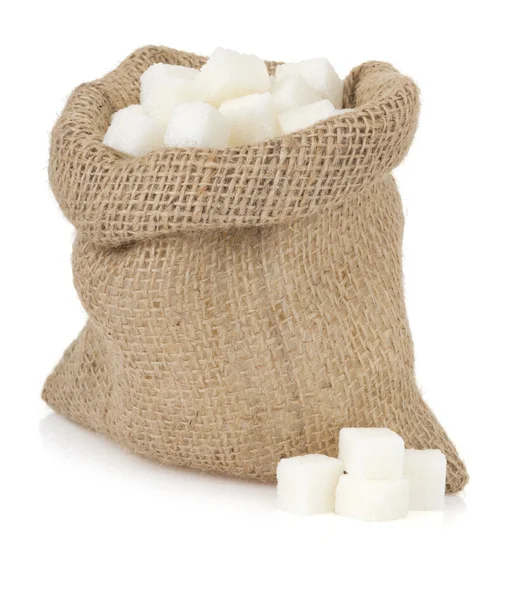 Sockerbitar på vit — Stockfoto