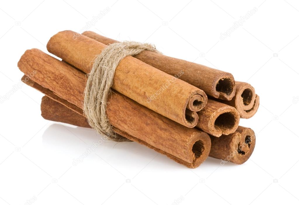 cinnamon sticks on white