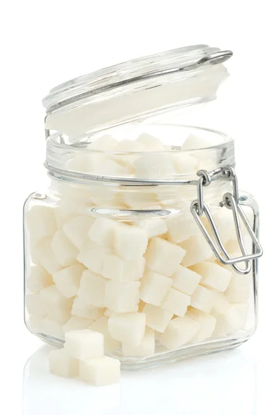 Sugar cubes on white — Stock Photo, Image