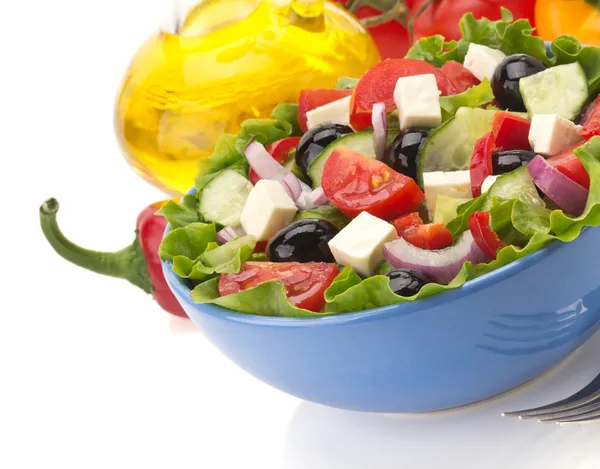 Salad in bowl on white — Stock Photo, Image