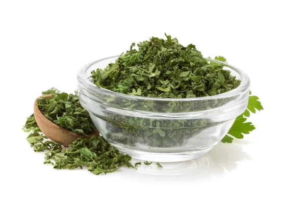 Dried parsley in bowl — Stock Photo, Image