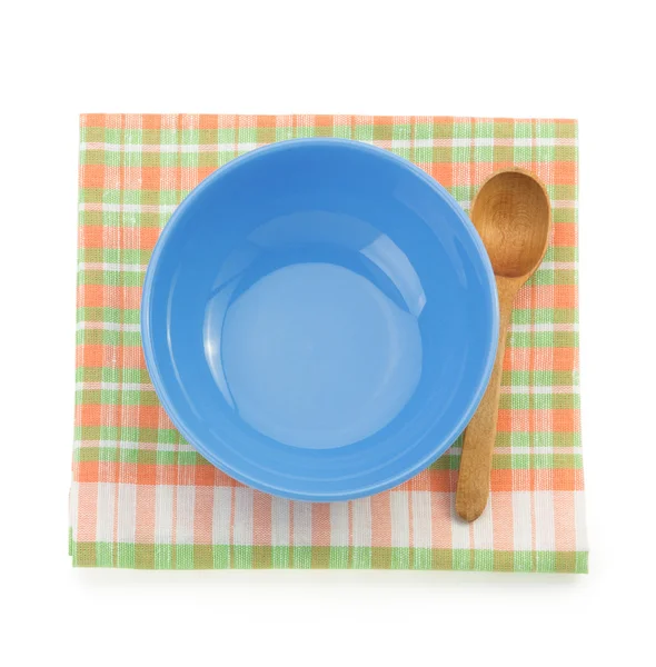 Plate and spoon on white — Stok fotoğraf