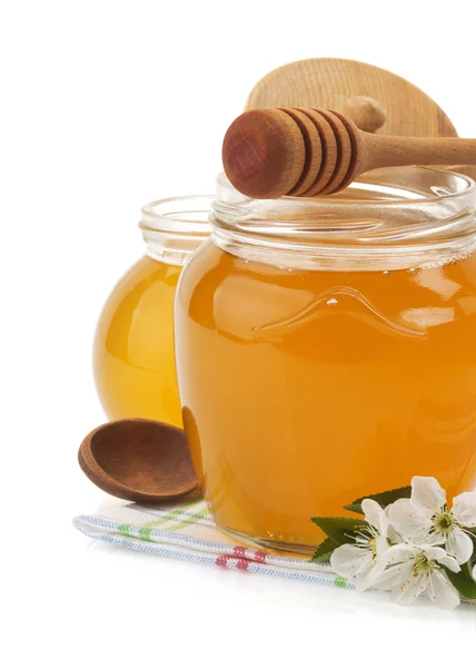 Γυάλινο βάζο γεμάτο μέλι και ραβδί — Φωτογραφία Αρχείου