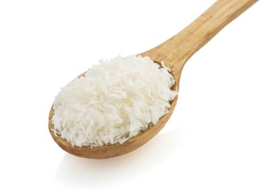 beyaz üzerine kaşık Hindistan cevizi yongası