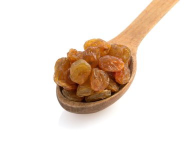 içinde beyaz üzerine kaşık kuru üzüm