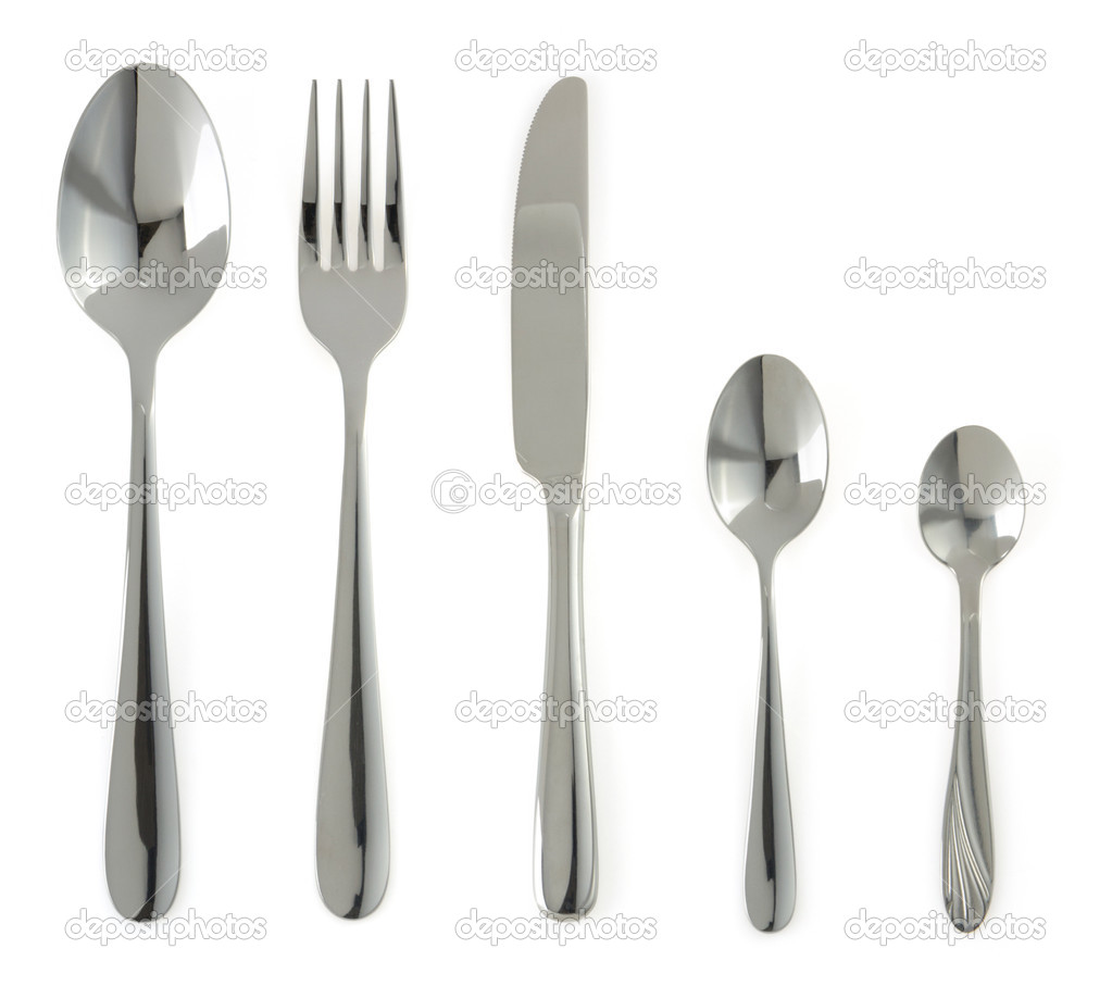 plate, knife and fork on white
