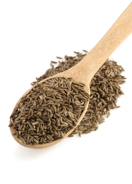 Cumin seeds in spoon — Stock Photo, Image