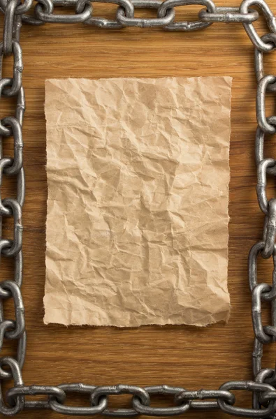 Metal chain and old paper — Stock Photo, Image
