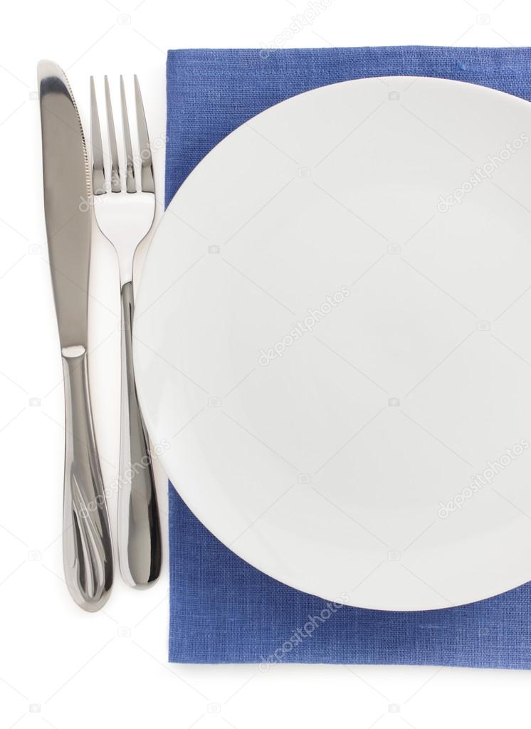 plate, knife and fork at napkin