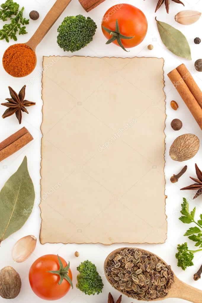 food ingredients and paper on white
