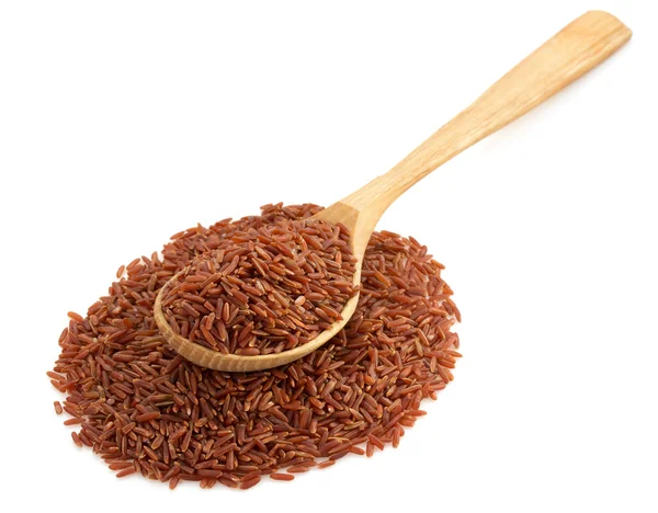 Rice in wooden spoon — Stock Photo, Image