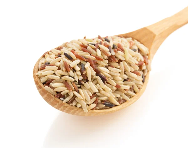 Rice in wooden spoon — Stock Photo, Image