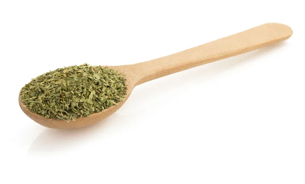 Torkade gröna kryddor i sked — Stockfoto