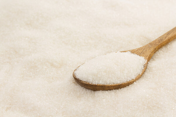 white sugar and spoon
