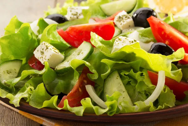 Greek salad in plate — Stock Photo, Image