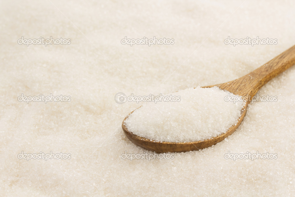 white sugar and spoon