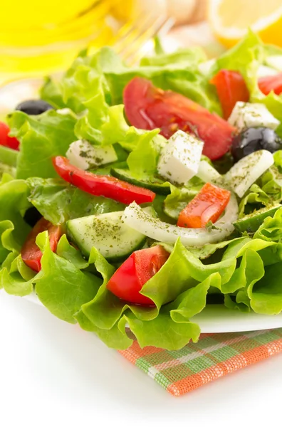 Salad in plate on white — Stock Photo, Image