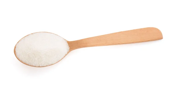 Zucchero e cucchiaio su bianco — Foto Stock