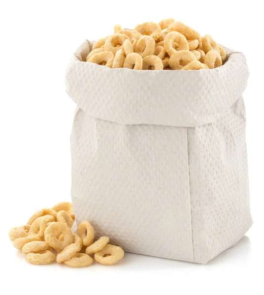 Corn flakes rings in paper bag — Stock Photo, Image