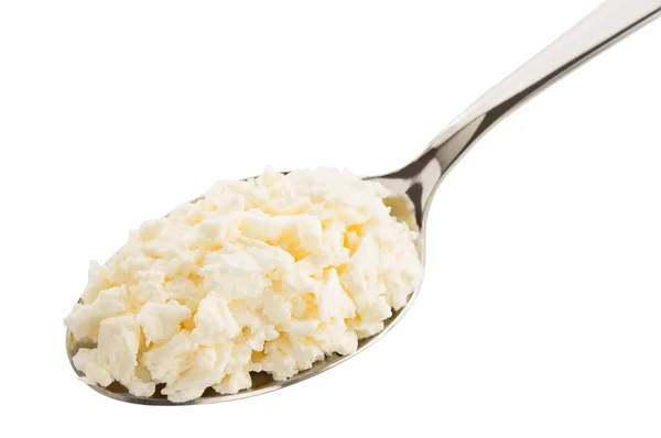 Cottage cheese in spoon — Stock Photo, Image