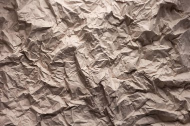 Arkaplan dokusu olarak paket kağıdı. Geri dönüşüm konsepti ve kahverengi kağıt yığını