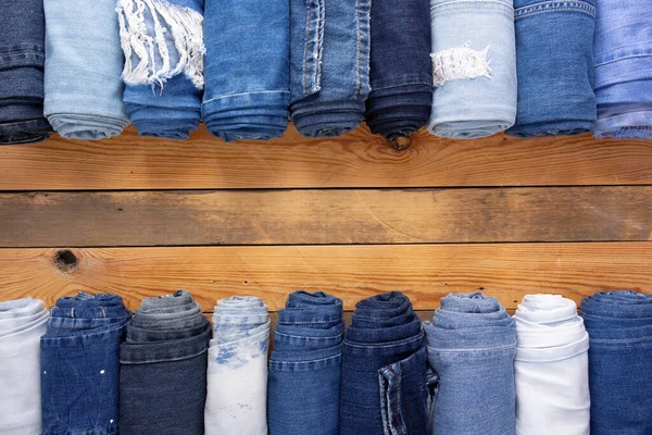 Jeans Denim Wooden Background Texture Blue Jeans Fabric Table — Zdjęcie stockowe