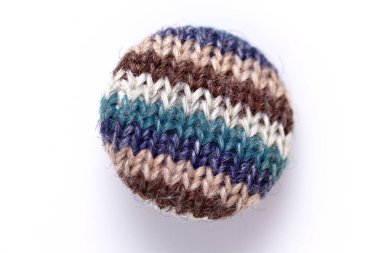 Button at white background. Fabric button closeup