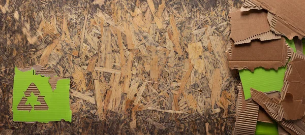 Kartónové Trhliny Hrany Recyklační Symbol Dřevěné Překližce Pozadí Textury Hnědý — Stock fotografie