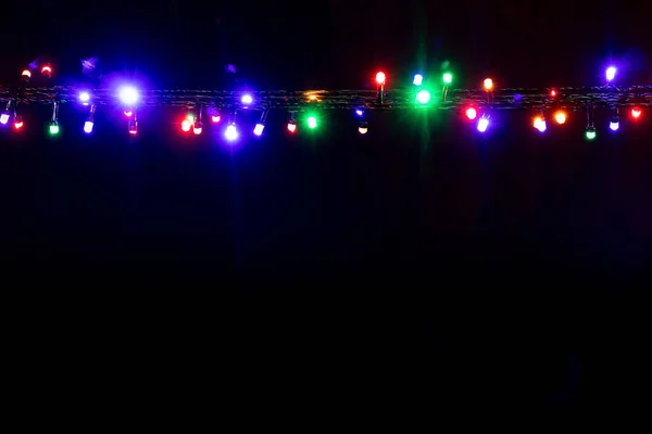 Christmas New Year Garland Bright Multi Colored Lights Black Isolated —  Fotos de Stock