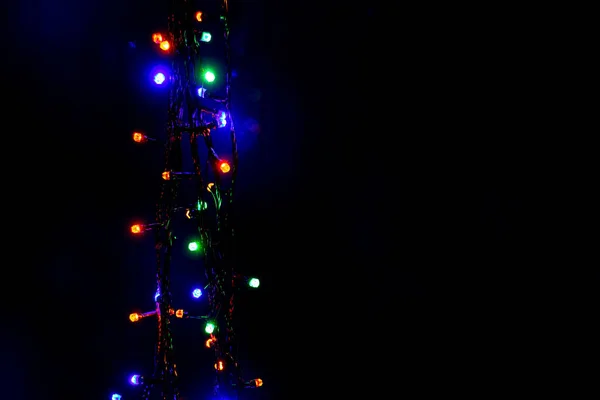 Multicolored Christmas New Year Garland Lights Black Background Vertically Copy — ストック写真