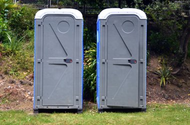 Two portable bathrooms clipart