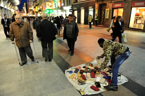 African street hawker in Madrid Spain — Stock Photo, Image