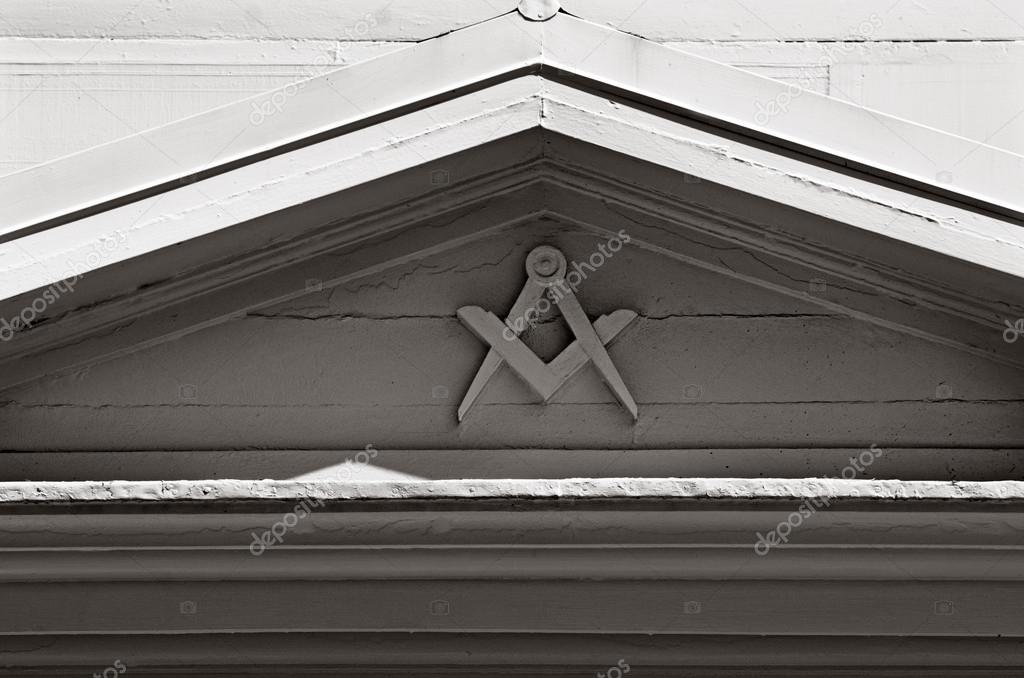 The symbol of the Freemasonry - Masonic square and compass.