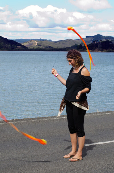 Woman perform Poi