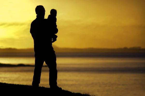Young father carries his child — Stock Photo, Image