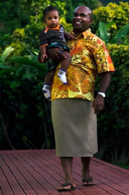 Fijian people - Fijian man carry his son clipart