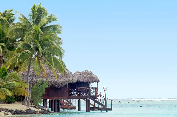 Reef Bungalows over tropical coral reef — Stock Photo, Image