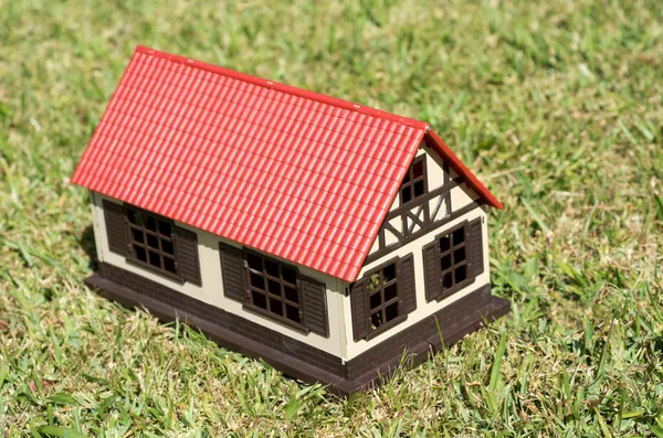 House on green grass — Stock Photo, Image