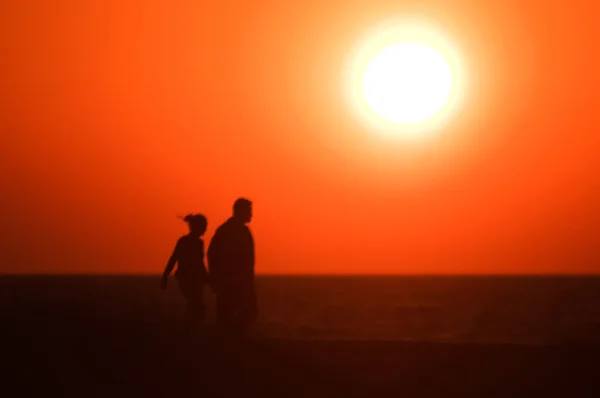 Sunset over lovers — Stock Photo, Image