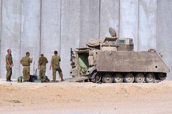 Israeli soldiers and armored vehicle