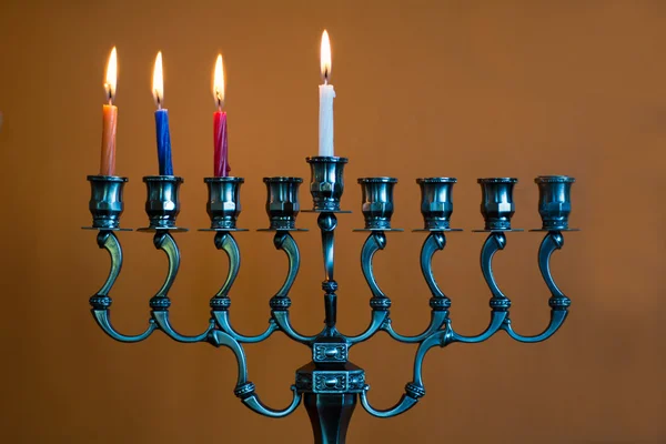 Hanukkah menorah on the third day of Hanukkah — Stock Photo, Image