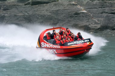 High speed jet boat ride - Queenstown NZ clipart