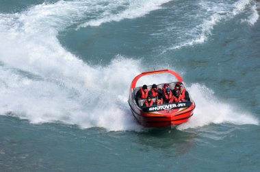 High speed jet boat ride - Queenstown NZ clipart