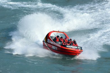 High speed jet boat ride - Queenstown NZ clipart